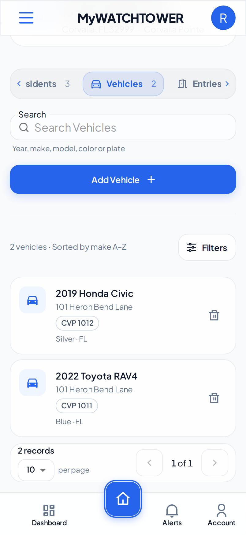 The Vehicles tab of 101 Heron Bend Lane on a phone, with Add Vehicle and two vehicles: a 2019 Honda Civic and a 2022 Toyota RAV4